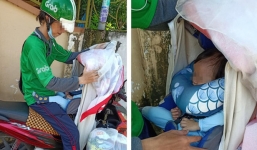 Bé trai theo cha chạy xe ôm dưới trời nắng 38 độ đã được mạnh thường quân giúp đỡ