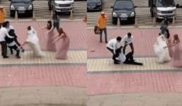 Váy cưới còn chưa cởi, cô dâu đã hùng hổ lao vào đạp chú rể ngã túi bụi làm ai cũng đoán mò lý do