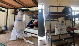 Em bé đi cách ly 'bơi' trong bộ đồ bảo hộ rộng thùng thình, ai nấy nhìn đều xót xa