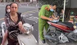 Người phụ nữ ra đường không đeo khẩu trang, tuyên bố 'không có virus': Cô con gái ngồi sau phải xấu hổ thay