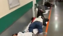 Bệnh nhân Covid-19 nằm la liệt trên hành lang bệnh viện Tây Ban Nha