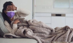 Người mắc Covid-19 có thể biểu hiện nhức đầu, chóng mặt