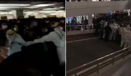 Hàng nghìn người bị lùa vào tầng hầm làm xét nghiệm Covid-19, Sân bay Trung Quốc hỗn loạn 