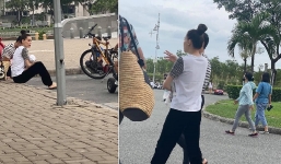 Vợ chồng Hồ Ngọc Hà - Kim Lý ôm con ngồi bệt vỉa hè, dân mạng lại soi túi bỉm sữa