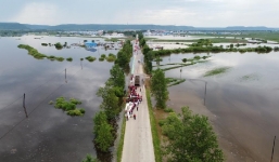 Trung Quốc - Indonesia hứng chịu mưa lũ khốc liệt