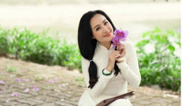 BTV Hoài Anh trong trẻo trong bộ áo dài trắng, khoe nhan sắc 'lão hóa ngược' ở tuổi 43