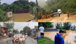 CHÙM ẢNH: Nghệ An nước ngập chạm nóc nhà, người dân nháo nhác di dời vật nuôi, tìm kiếm 2 người mất tích
