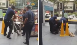 Thót tim cảnh trăn khổng lồ cuốn chặt tay rồi vật người đàn ông ra giữa phố