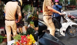 Hình ảnh đẹp: CSGT trầy xước sau va chạm xe máy với người phụ nữ và câu nói đáng giá