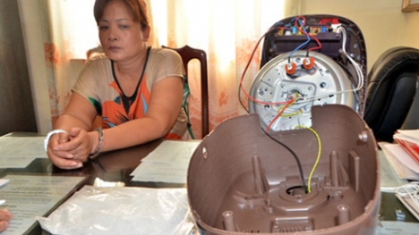 Người phụ nữ 48 tuổi giấu nửa cân ma túy dưới đáy nồi cơm điện