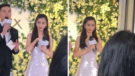 Angelababy hoảng hốt vì sự cố váy sắp tuột trước ống kính