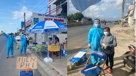 Ấm lòng khoảnh khắc người phụ nữ đi dép tổ ong, cầm xấp tiền hỗ trợ bà con hồi hương tránh dịch 