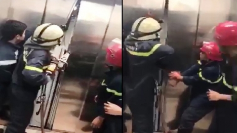 Cảnh sát phá cửa thang máy cứu sống 21 người mắc kẹt lúc nửa đêm