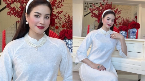 Hoa hậu Phạm Hương mặc áo dài khoe visual cực 'keo', đeo trang sức sang chảnh đón Tết ở trời Tây