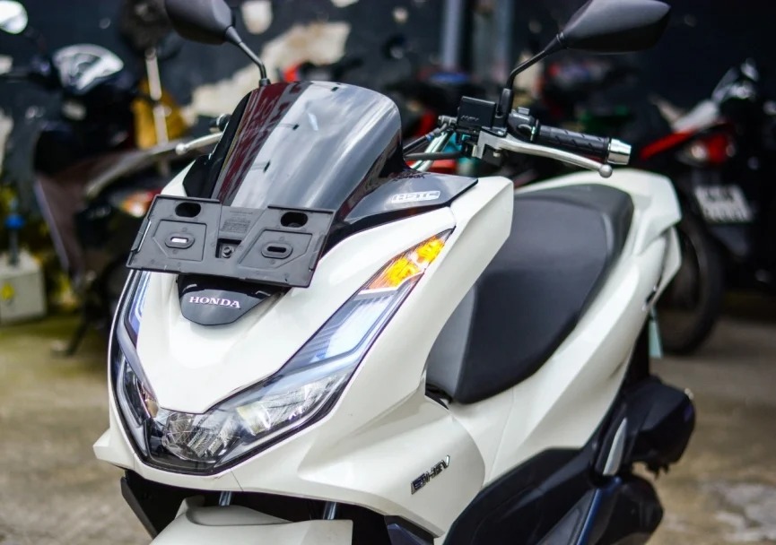 Honda PCX bản tiết kiệm xăng chính thức về Việt Nam, giá bán bất ngờ - Ảnh 2