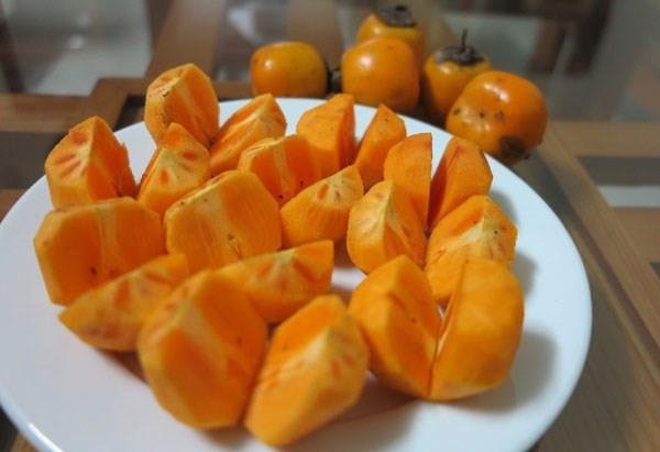 Quả hồng có nhiều tác dụng tốt cho sức khỏe nếu ăn đúng cách. Ảnh internet