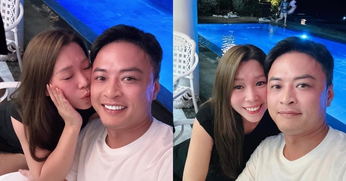 Hồng Đăng hạnh phúc bên vợ. Ảnh FBNV