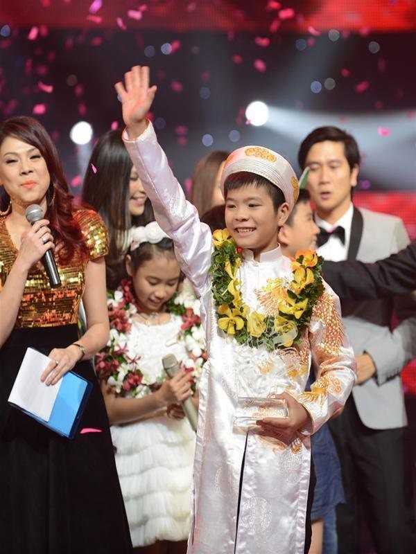 Quang Anh đăng quang ngôi vị cao nhất của Giọng hát Việt nhí 2013. Ảnh: Internet Quang Anh đăng quang ngôi vị cao nhất của Giọng hát Việt nhí 2013. Ảnh: Internet