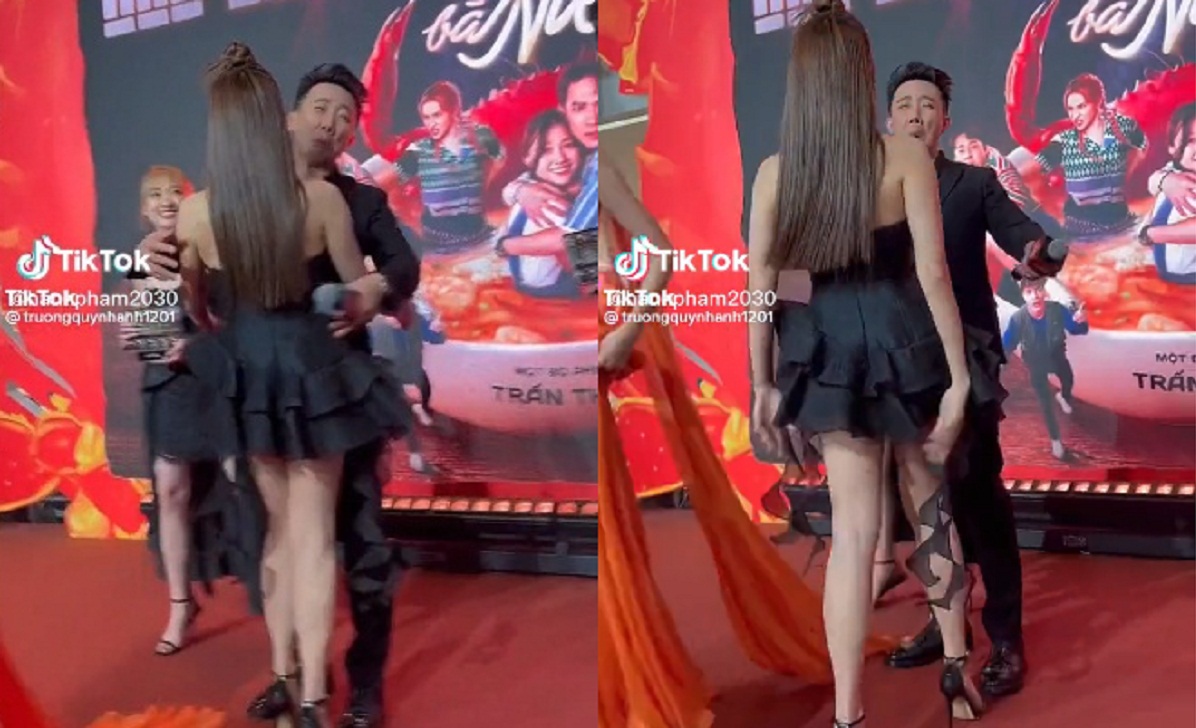 Trương Quỳnh Anh chủ động dùng tay để che chắn, giữ tà váy gọn gàng.