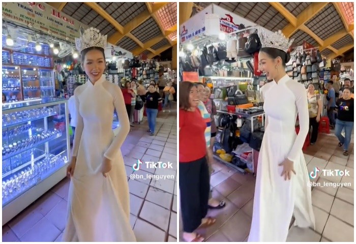 Bị thắc mắc lý do đi dạo chợ nhưng vẫn đội vương miện, Hoa hậu Bảo Ngọc bèn lên tiếng giải thích và nhận được sự thông cảm của khán giả. Ảnh: Chụp màn hình clip. Bị thắc mắc lý do đi dạo chợ nhưng vẫn đội vương miện, Hoa hậu Bảo Ngọc bèn lên tiếng giải thích và nhận được sự thông cảm của khán giả. Ảnh: Chụp màn hình clip.