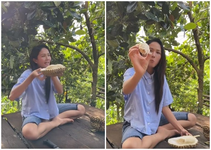 Hoa hậu tự tay tách múi và thưởng thức sầu riêng trắng.  Ảnh chụp màn hình.