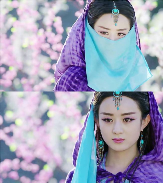 Triệu Lệ Dĩnh trong trang phục dị tộc với khăn che mặt cũng vô cùng xinh đẹp nhất là khoảnh khắc tháo khăn.