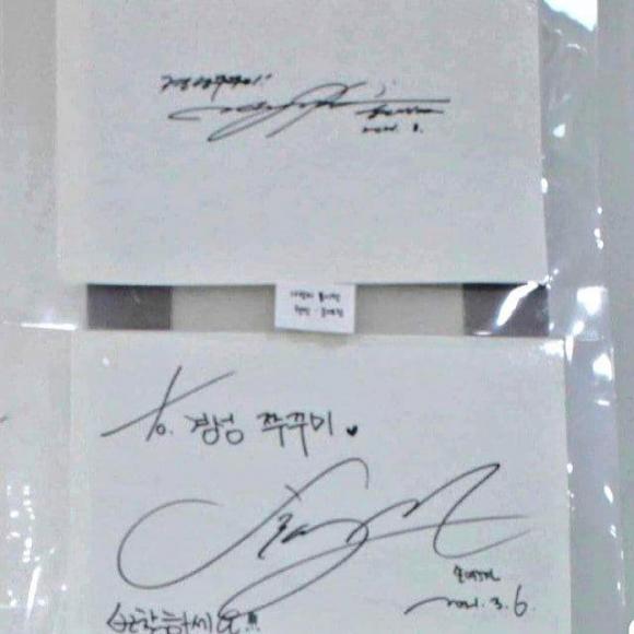 Cặp đôi không ngần ngại để lại chữ ký của mình tại bảng hiệu của quán. Ảnh: Sohu