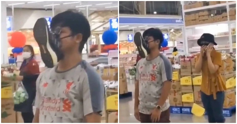 Thanh niên đeo giày lên mặt vì chót quên khẩu trang khi đi mua sắm