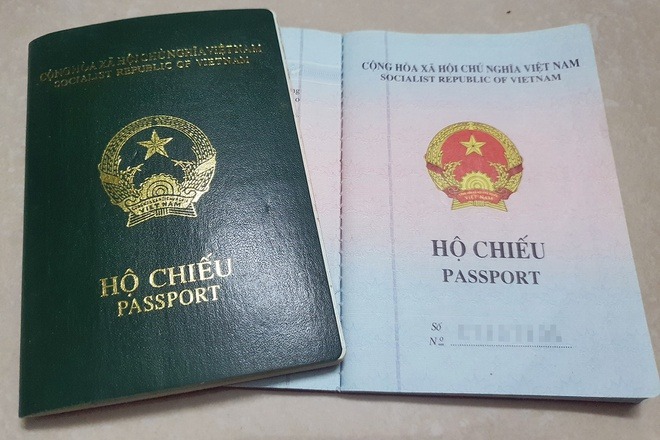 Hộ chiếu kiểu mới gắn chip có hiệu lực từ 14/8 2 Hộ chiếu kiểu mới gắn chip có hiệu lực từ 14/8 2