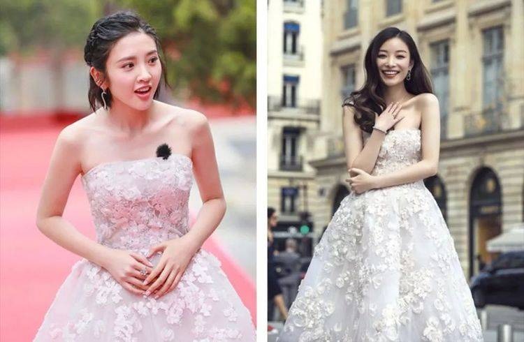 Đường Nghệ Hân và Nghê Ni cũng từng có màn đụng hàng váy quây trắng trên thảm đỏ. Nếu Nghê Ni tạo cảm giác sang trọng, khí chất thì Đường Nghệ Hân lại lép vế hơn. Chiếc váy quây màu trắng này rất thanh lịch nên có nhiều sao nữ Cbiz đã mặc nó. Chỉ cần bạn có được khí chất tao nhã và cá tính thì chắc chắn sẽ chiếm spotlight.