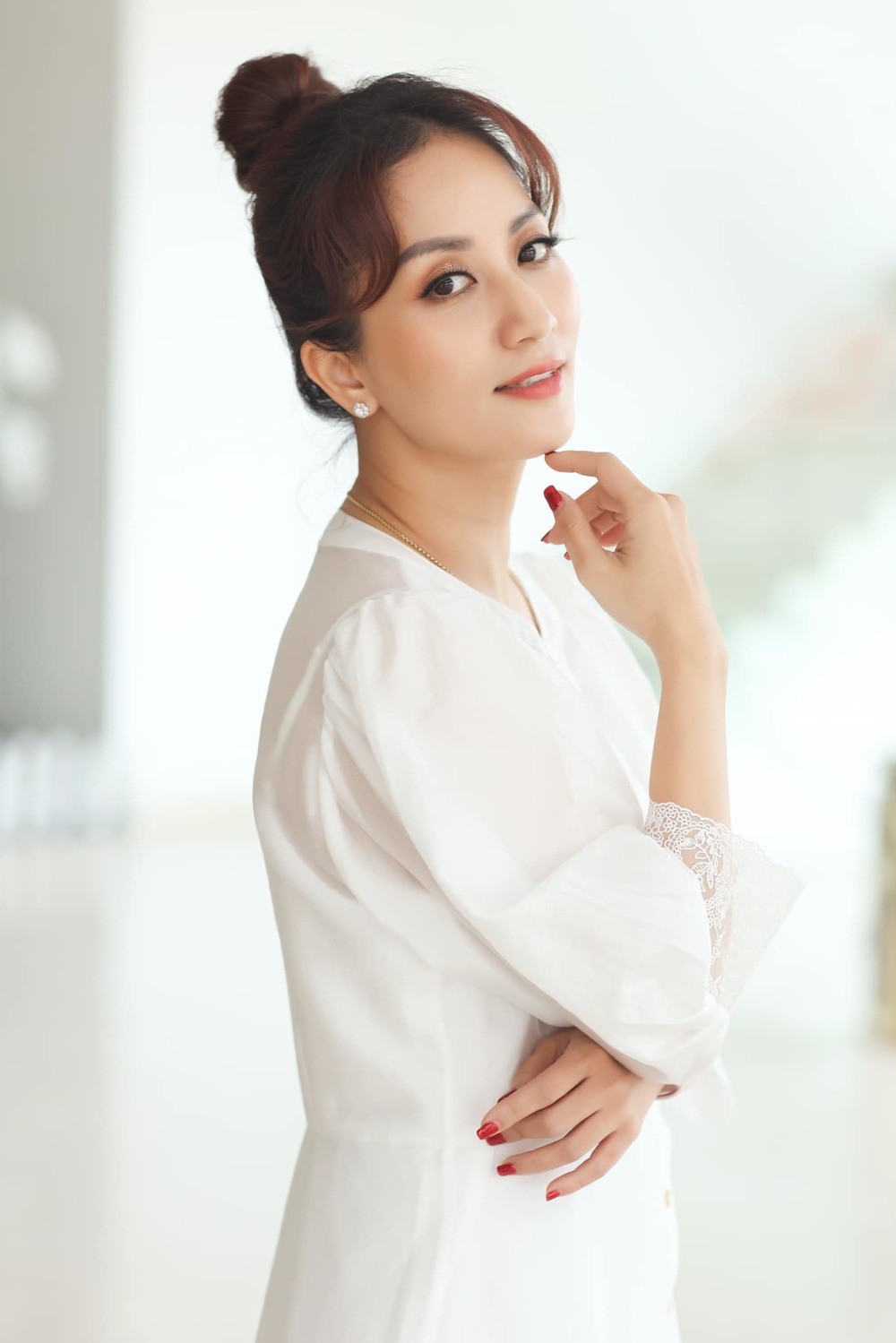 Khánh Thi phủ nhận chuyện mang thai con thứ 3.