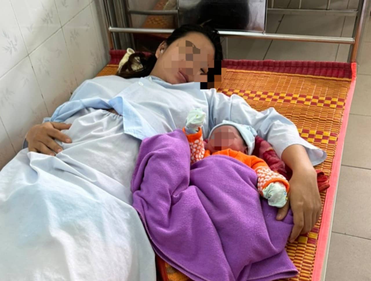 Mẹ con sản phụ Ng.