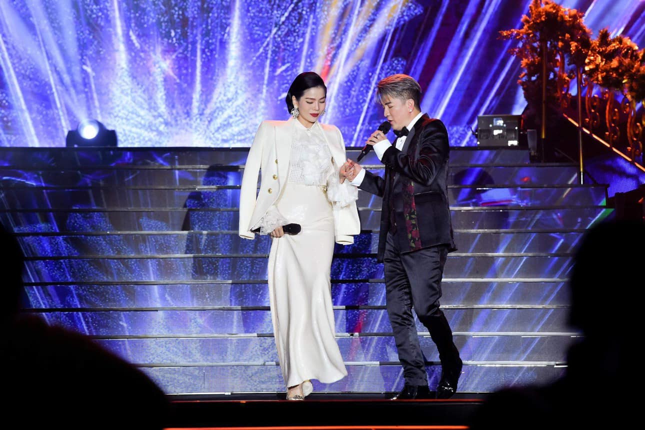 Lệ Quyên e ấp bên Đàm Vĩnh Hưng