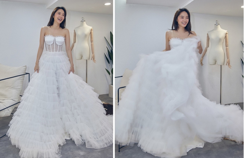 Minh Hằng thử váy cưới để chuẩn bị cho hôn lễ với bạn trai đại gia. Minh Hằng thử váy cưới để chuẩn bị cho hôn lễ với bạn trai đại gia.