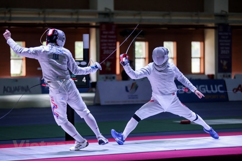 Vũ Thành An áp đảo với tỷ số 15/7 qua đó bảo vệ thành công tấm huy chương Vàng SEA Games 31. Ảnh: Vietnam+ Vũ Thành An áp đảo với tỷ số 15/7 qua đó bảo vệ thành công tấm huy chương Vàng SEA Games 31. Ảnh: Vietnam+