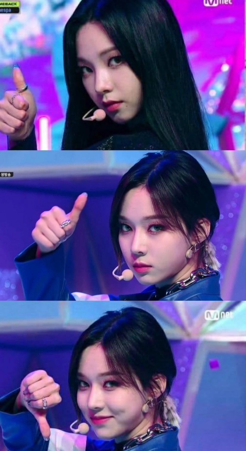 Karina với visual đẹp không tì vết cùng thần thái thì Winter lại lầy lội trước ống kính, khi ban đầu giơ ngón tay theo biểu tượng không thích rồi sau đó quay ngược lại. Ảnh: Naver Karina với visual đẹp không tì vết cùng thần thái thì Winter lại lầy lội trước ống kính, khi ban đầu giơ ngón tay theo biểu tượng không thích rồi sau đó quay ngược lại. Ảnh: Naver