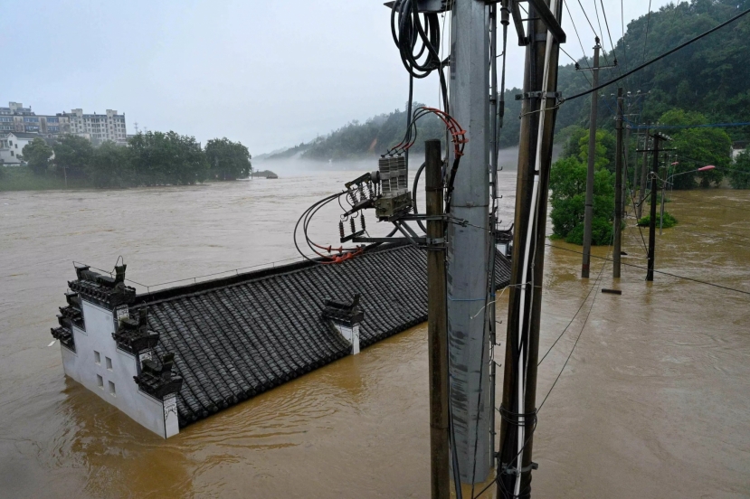 Lũ lụt đã buộc hàng trăm nghìn người phải sơ tán trên khắp miền nam Trung Quốc. Ảnh: CNS Lũ lụt đã buộc hàng trăm nghìn người phải sơ tán trên khắp miền nam Trung Quốc. Ảnh: CNS