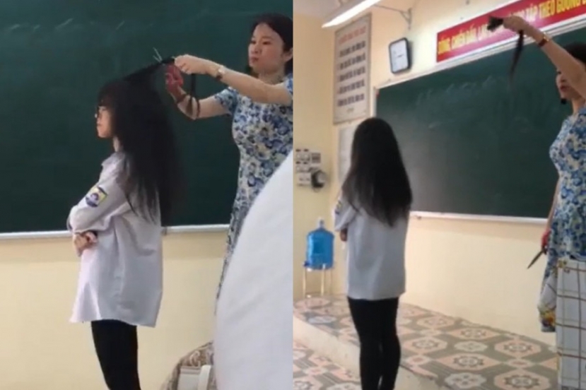 Cô giáo đã cắt tóc học sinh ngay trên lớp (Ảnh lấy từ clip). Cô giáo đã cắt tóc học sinh ngay trên lớp (Ảnh lấy từ clip).