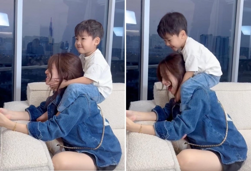 Hình ảnh Hòa Minzy cùng bé Bo. Ảnh cắt từ clip Hình ảnh Hòa Minzy cùng bé Bo. Ảnh cắt từ clip
