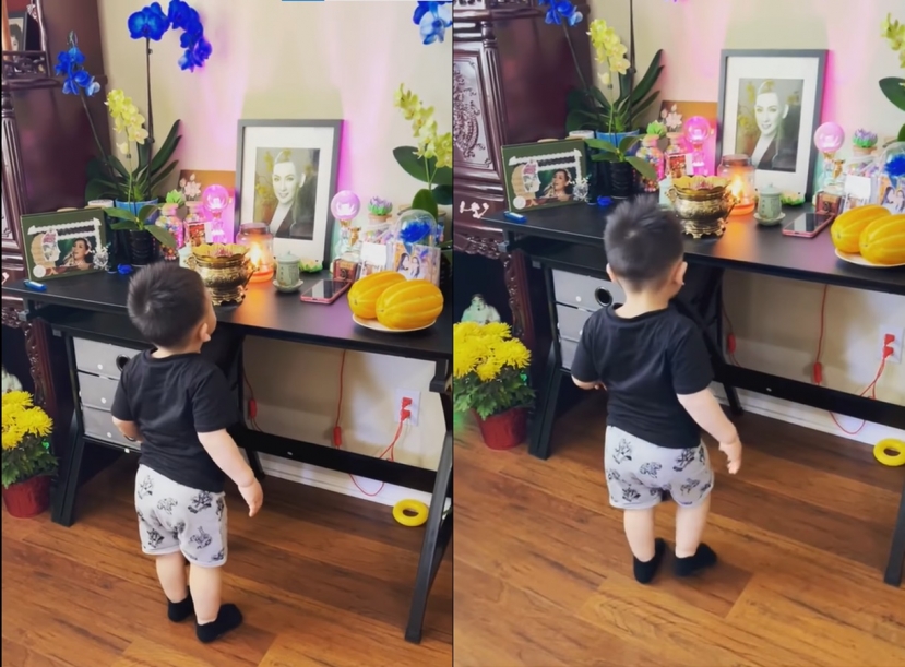 Cháu ngoại thứ 2 của Phi Nhung hào hứng chạy đến trước bàn thờ bà, dưới sự hướng dẫn của mẹ, cậu bé liên tục cúi người thành kính, miệng lẩm bẩm 'ạ... ạ' Cháu ngoại thứ 2 của Phi Nhung hào hứng chạy đến trước bàn thờ bà, dưới sự hướng dẫn của mẹ, cậu bé liên tục cúi người thành kính, miệng lẩm bẩm 'ạ... ạ'